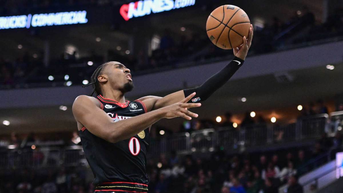 Philadelphia 76ers guard Tyrese Maxey (0) takes a shot in the 3rd quarter against the Milwaukee Bucks at Fiserv Forum. Mandatory Credit: Benny Sieu-Imagn Images