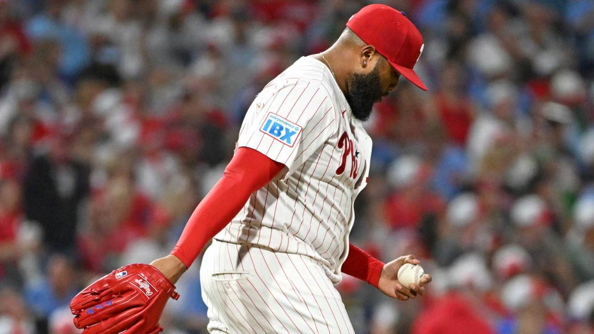 Philadelphia Phillies pitcher José Alvarado (46) gets a new baseball after allowing a two-run home run during the ninth inning Atlanta Braves at Citizens Bank Park.