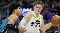 Utah Jazz forward Lauri Markkanen (23) dribbles defended by Detroit Pistons guard Killian Hayes (7) in the second half at Little Caesars Arena.