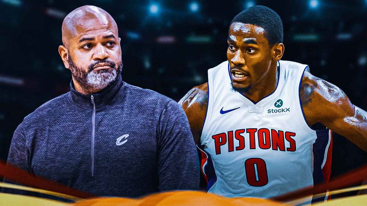 Jalen Duren and JB Bickerstaff next to each other on basketball court Detroit Pistons