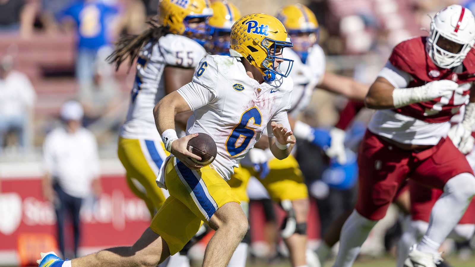 Pittsburgh Panthers quarterback Mason Heintschel (6) runs the ball against the Stanford Cardinal during the second quarter at Stanford Stadium.