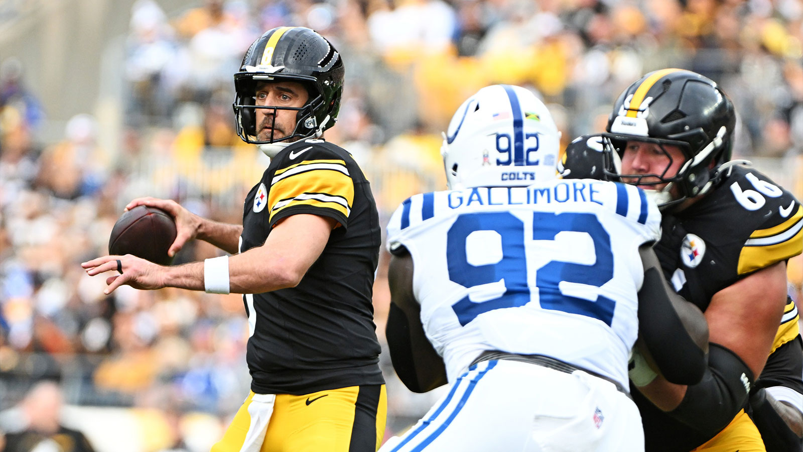 Pittsburgh Steelers quarterback Aaron Rodgers (8) drops back to make a pass
