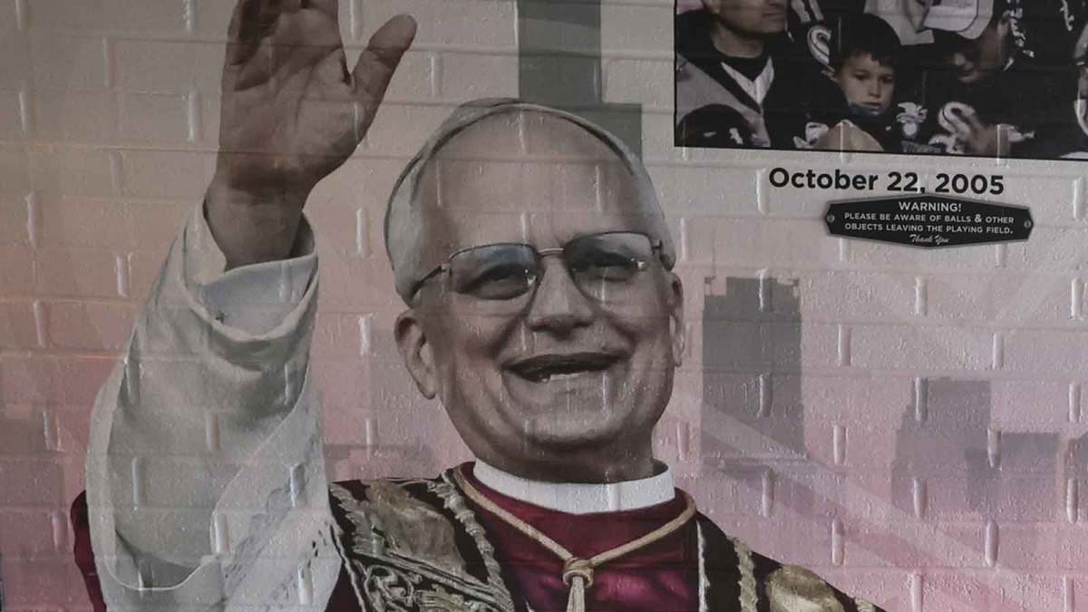 May 23, 2025; Chicago, Illinois, USA; Fandom of Pope Leo XIV with graphics is seen before a baseball game between the Chicago White Sox and Texas Rangers at Rate Field. Mandatory Credit: Kamil Krzaczynski-Imagn Images