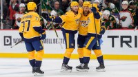 Nashville Predators center Steven Stamkos (91) celebrates with teammates after scoring on the Minnesota Wild with just 0.3 seconds left in the third period at Grand Casino Arena.