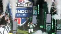 New York Jets defensive tackle Quinnen Williams (95) enters the field during an NFL International Series game against the Denver Broncos at Tottenham Hotspur Stadium.