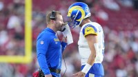 Los Angeles Rams head coach Sean McVay talks with Los Angeles Rams quarterback Matthew Stafford (9) during the fourth quarter against the San Francisco 49ers at Levi's Stadium.