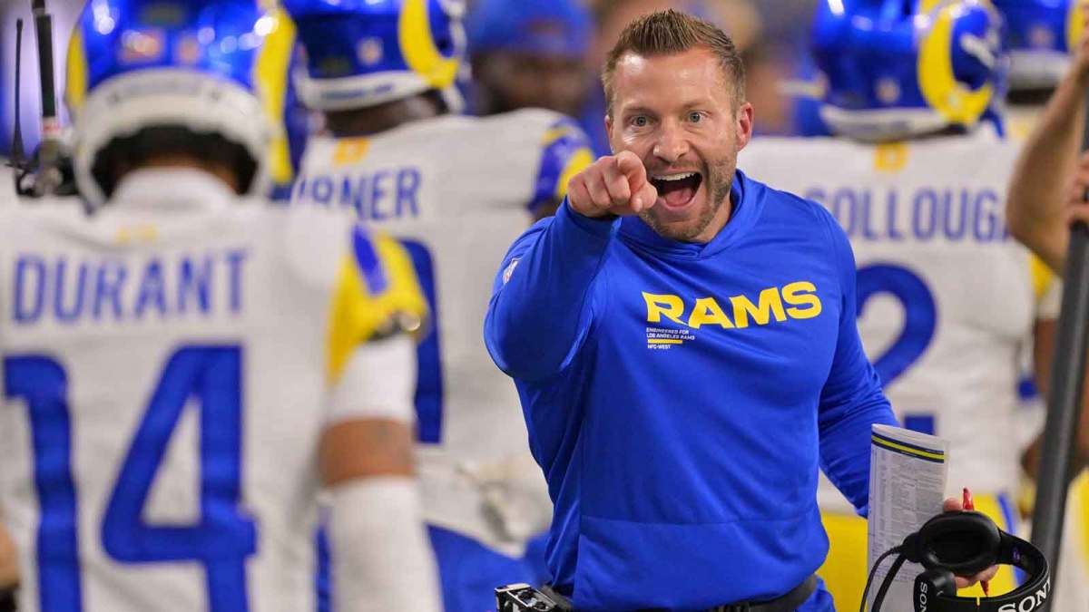 Los Angeles Rams head coach Sean McVay celebrates with cornerback Cobie Durant (14) after Durant returned an interception for a touchdown against the Tampa Bay Buccaneers during the first quarter at SoFi Stadium.