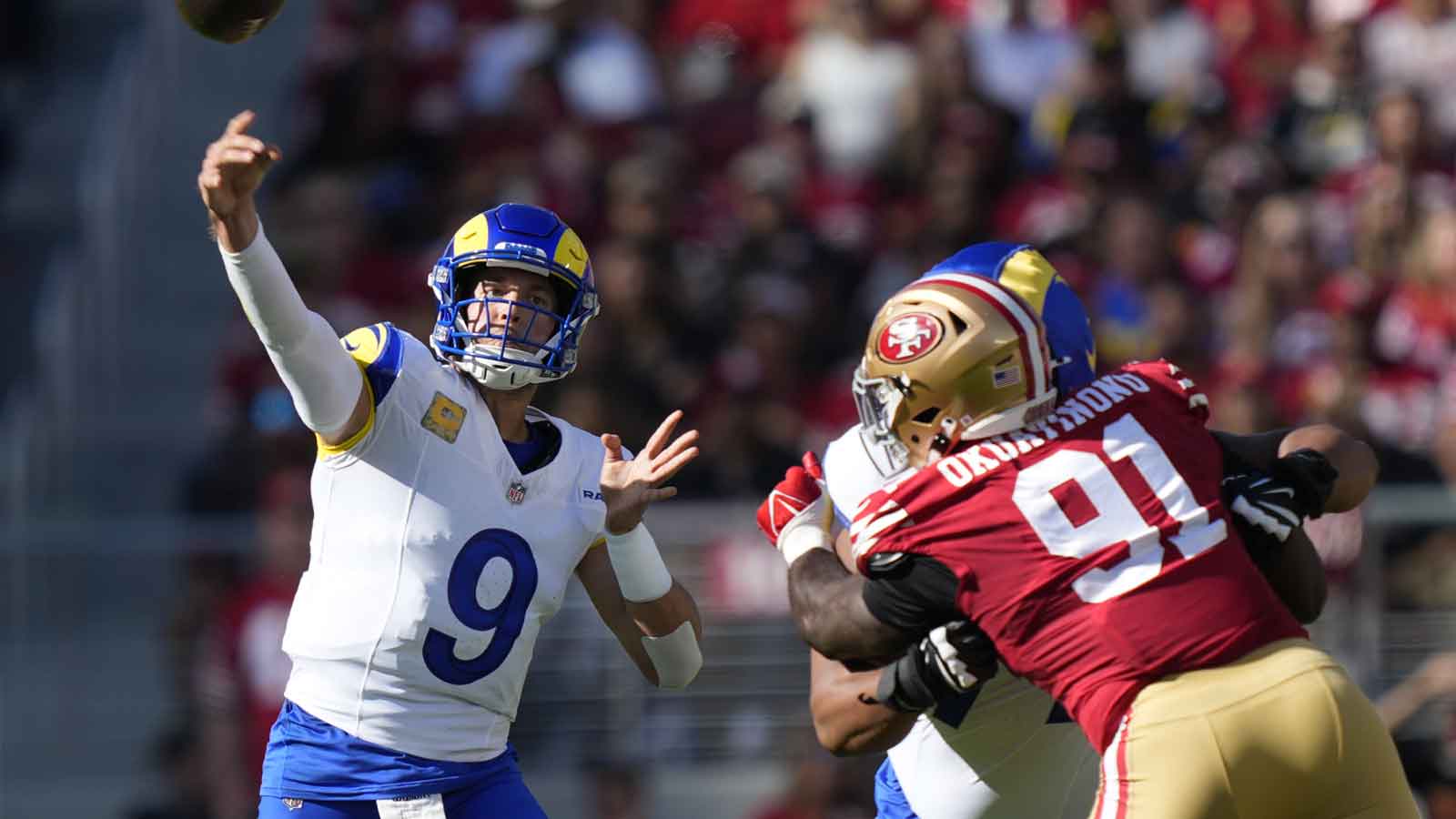 Los Angeles Rams quarterback Matthew Stafford (9) throws a pass during the first quarter against the San Francisco 49ers at Levi's Stadium.