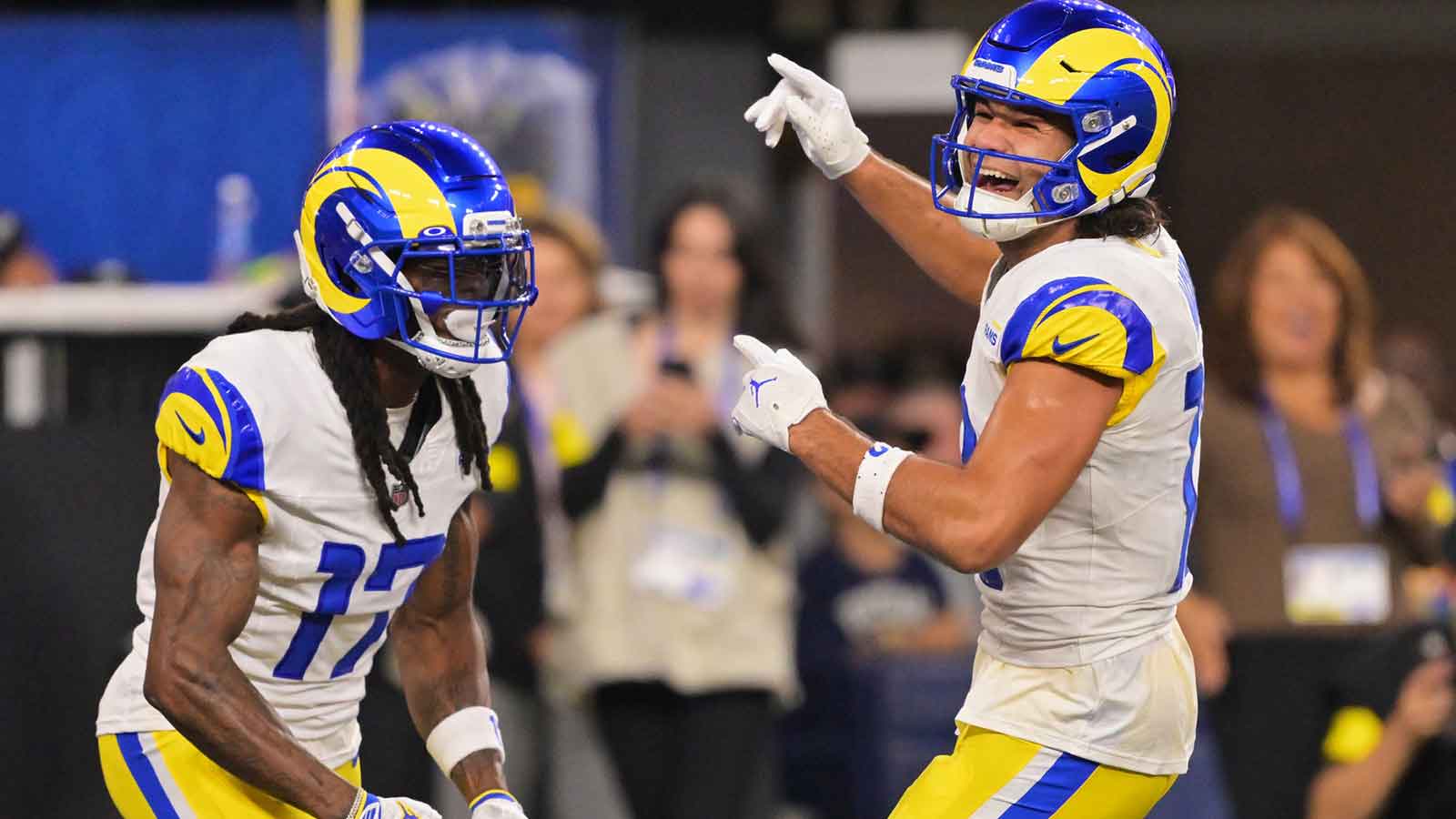 Los Angeles Rams wide receiver Puka Nacua (12) celebrates with wide receiver Davante Adams (17) after Adams scored a touchdown against the Tampa Bay Buccaneers during the second quarter