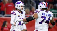 Buffalo Bills quarterback Josh Allen (17) celebrates with offensive tackle Ryan Van Demark (74) after a touchdown against the Houston Texans in the first quarter at NRG Stadium. Mandatory Credit: Troy Taormina-Imagn Images