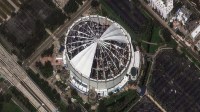 The roof of Tropicana Field, home of the Tampa Bay Rays MLB team, was torn off by Hurricane Milton's powerful winds. Satellite imagery from Maxar shows the destruction on Oct. 10, 2024. Prior to landfall, the stadium was converted into a base camp for emergency responders.