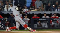 Boston Red Sox outfielder Jarren Duran (16) breaks his bat as he lines out during the first inning against the New York Yankees during game three of the Wildcard round for the 2025 MLB playoffs at Yankee Stadium.