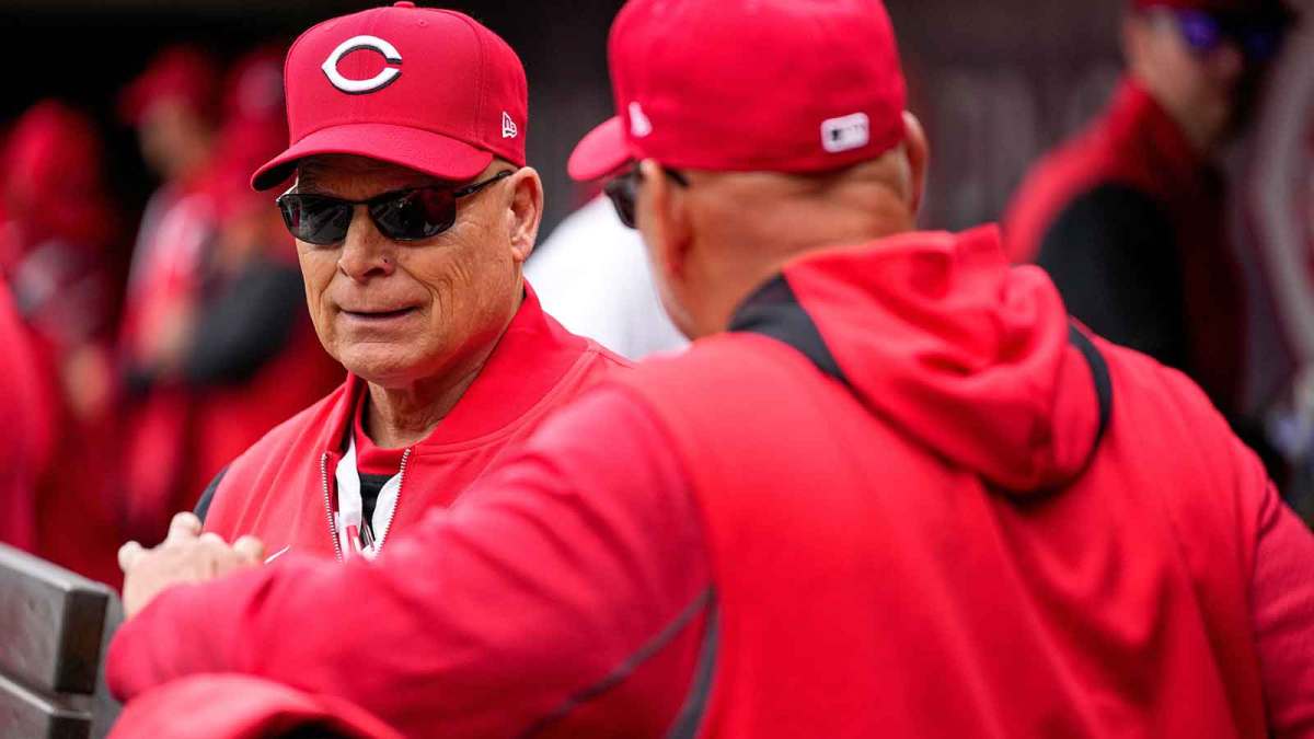 Cincinnati Reds bench coach Brad Mills (73) talks with manager Terry Francona (77) before the first inning of the MLB Opening Day game between the Cincinnati Reds and the San Francisco Giants.
