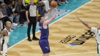 Charlotte Hornets guard Kon Knueppel (7) shoots from the side against the Milwaukee Bucks during the secondt quarter at Spectrum Center.