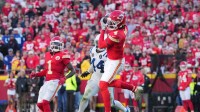 Kansas City Chiefs wide receiver Rashee Rice (4) makes a catch against the Indianapolis Colts in overtime at GEHA Field at Arrowhead Stadium.