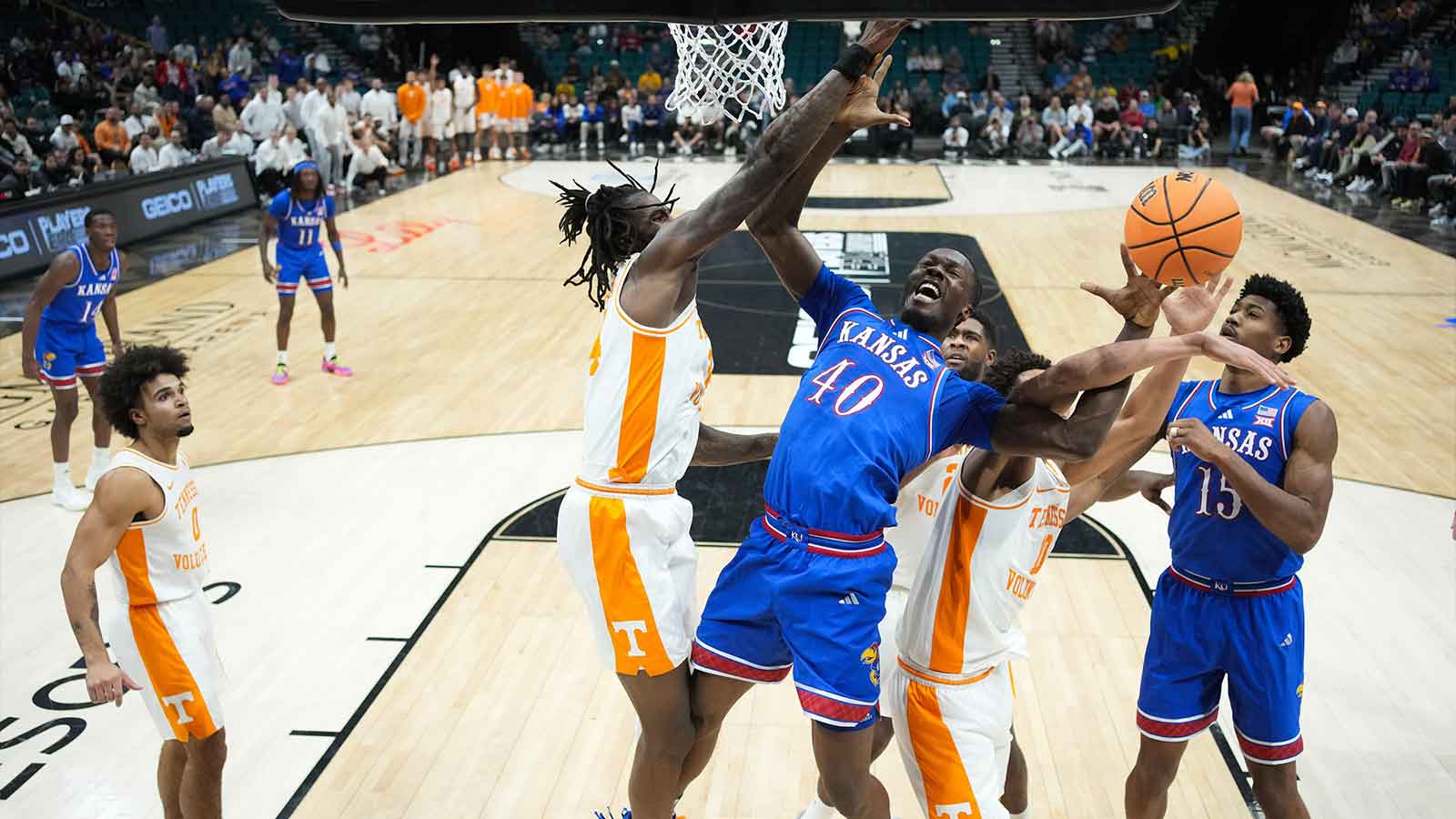 Kansas Jayhawks forward Flory Bidunga (40) is fouled by Tennessee Volunteers forward Nate Ament (10) in the second half in the 2025 Players Era Festival third place game at MGM Grand Garden Arena.