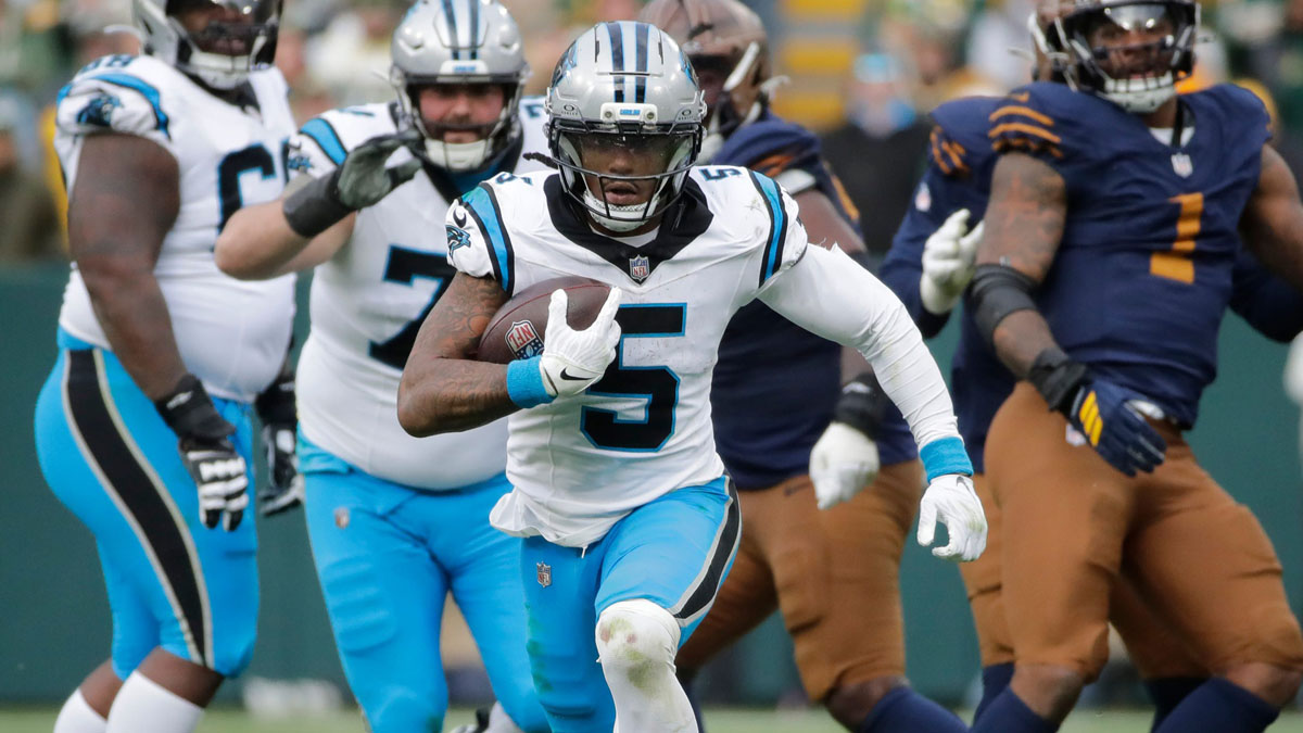 Carolina Panthers running back Rico Dowdle (5) breaks away for a long gain with less than a minute left in the game against the Green Bay Packers during their football game Sunday, November 2, 2025, at Lambeau Field in Green Bay, Wisconsin. Carolina won 16-13.