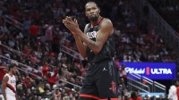 Rockets forward Kevin Durant (7) claps after a play during the fourth quarter against the Portland Trail Blazers at Toyota Center