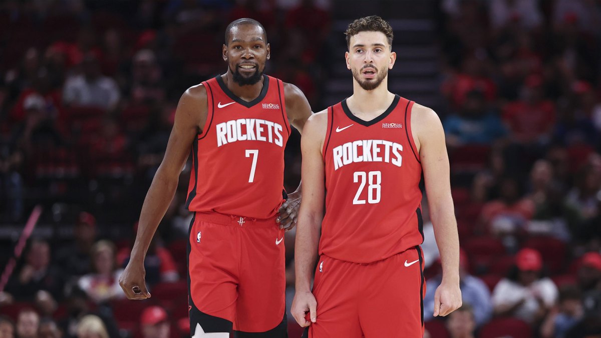 Rockets forward Kevin Durant (7) and center Alperen Sengun (28) stand on the court during the first quarter against the Detroit Pistons at Toyota Center