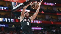 Houston Rockets guard Reed Sheppard (15) dunks the ball during the second quarter against the Denver Nuggets at Toyota Center.