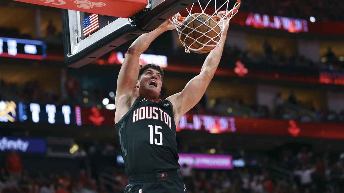 Houston Rockets guard Reed Sheppard (15) dunks the ball during the second quarter against the Denver Nuggets at Toyota Center.