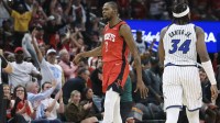 Rockets forward Kevin Durant (7) reacts after making a basket