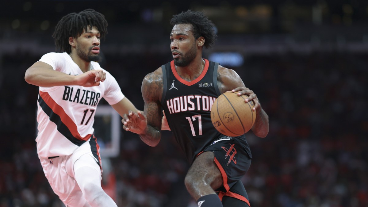 Rockets forward Tari Eason (17) drives with the ball as Portland Trail Blazers guard Shaedon Sharpe (17) defends during the second quarter at Toyota Center