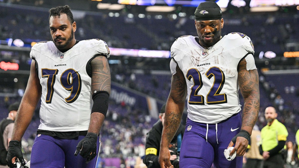 Baltimore Ravens running back Derrick Henry (22) and offensive tackle Ronnie Stanley (79) come off the field after the game against the Minnesota Vikings at U.S. Bank Stadium.