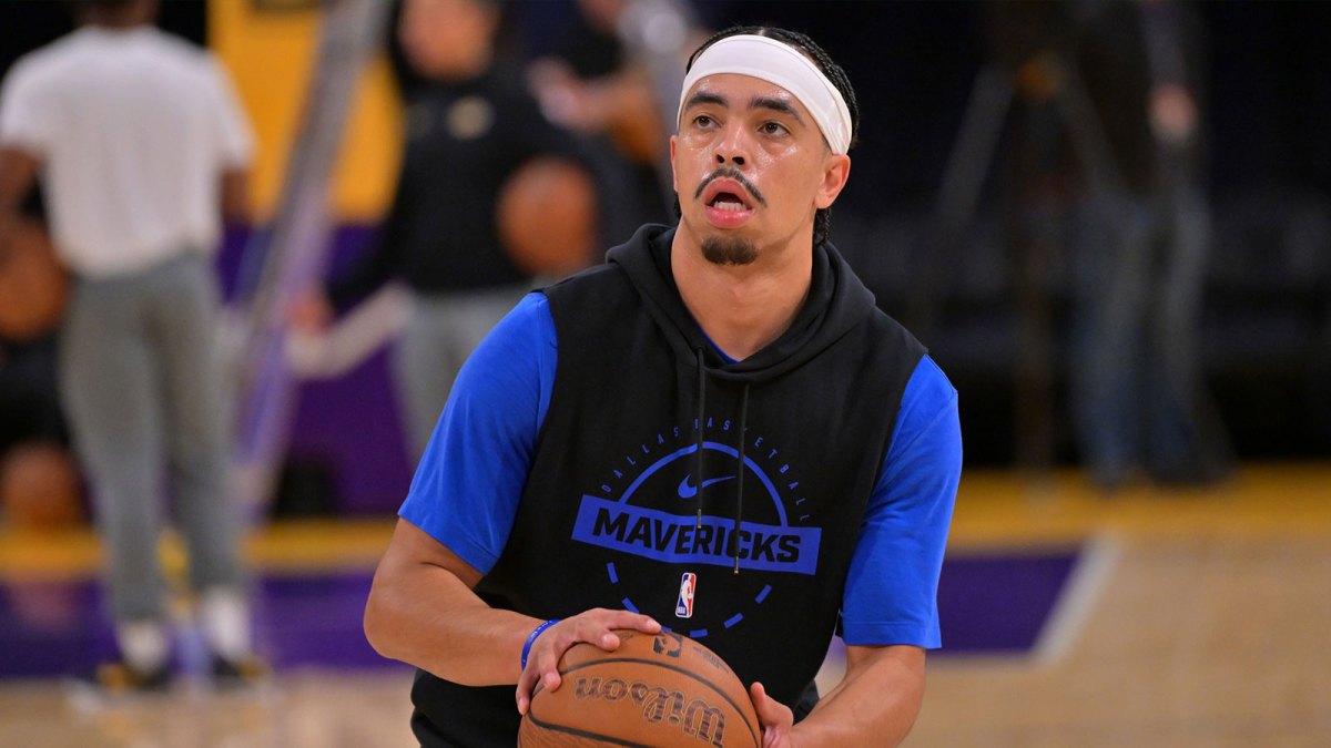 Dallas Mavericks guard Ryan Nembhard (9) warms up prior to the game against the Los Angeles Lakers at Crypto.com Arena. Mandatory Credit: Jayne Kamin-Oncea-Imagn Images