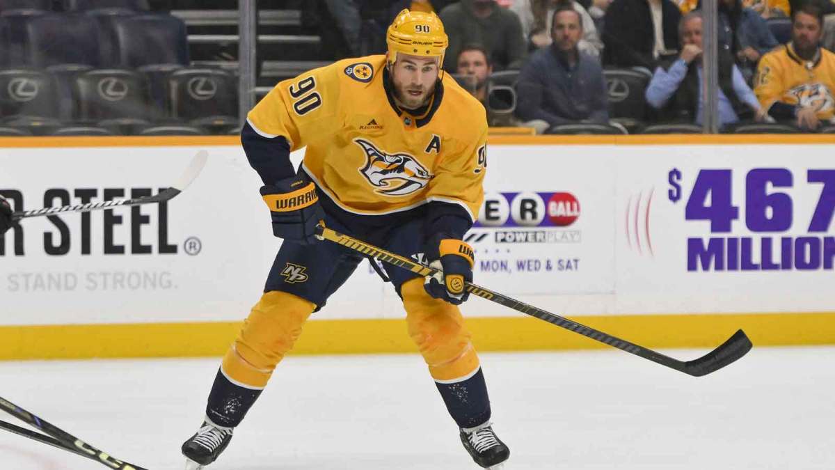 Nashville Predators center Ryan O'Reilly (90) skates with the puck against the Philadelphia Flyersduring the first period at Bridgestone Arena