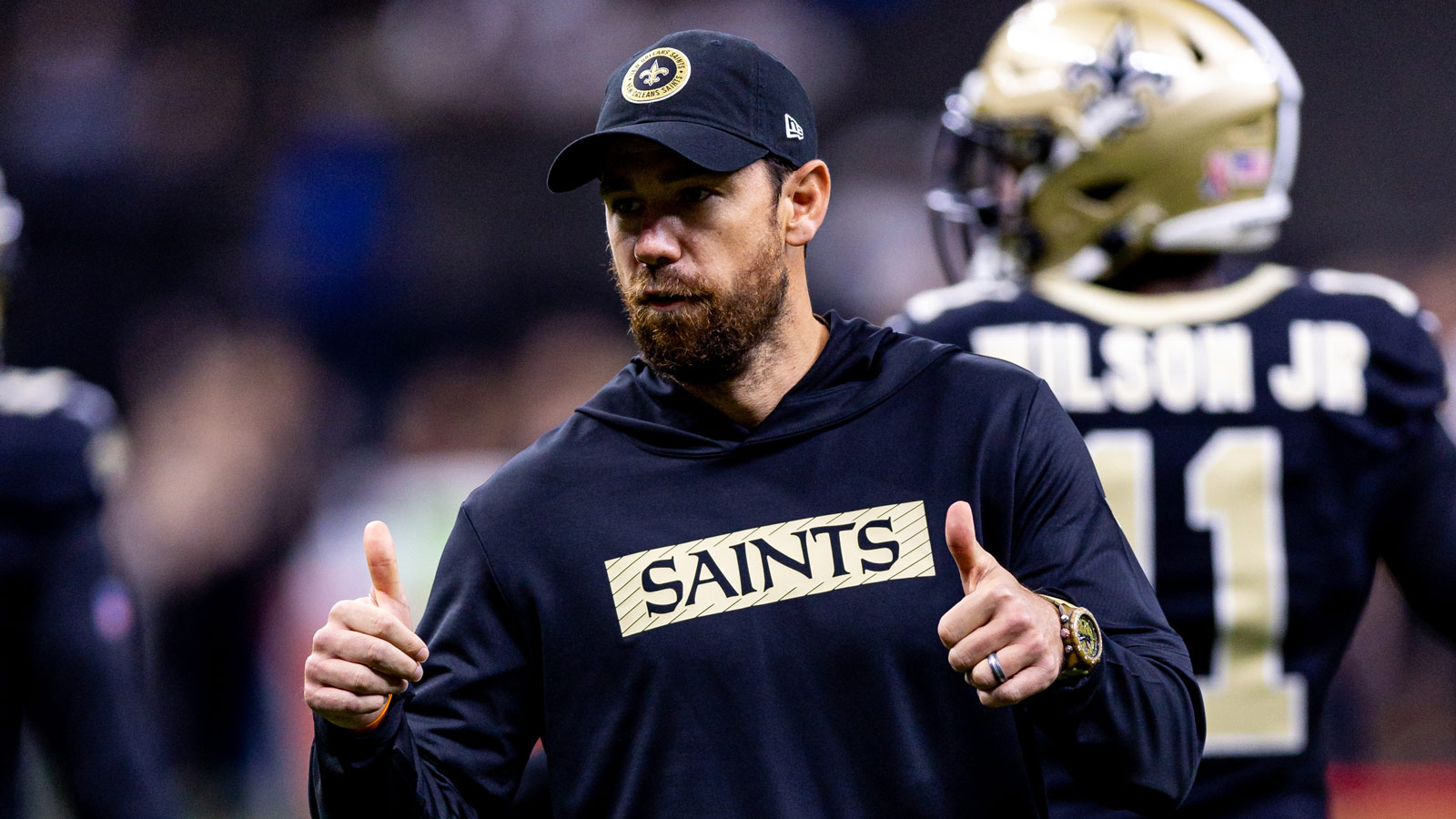 New Orleans Saints offensive coordinator Klint Kubiak reacts against the Carolina Panthers during the pregame at Caesars Superdome.