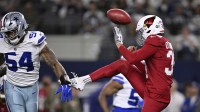 Dallas Cowboys defensive end Sam Williams (54) blocks a punt by Arizona Cardinals punter Pat O'Donnell (39) in the first half at AT&T Stadium.