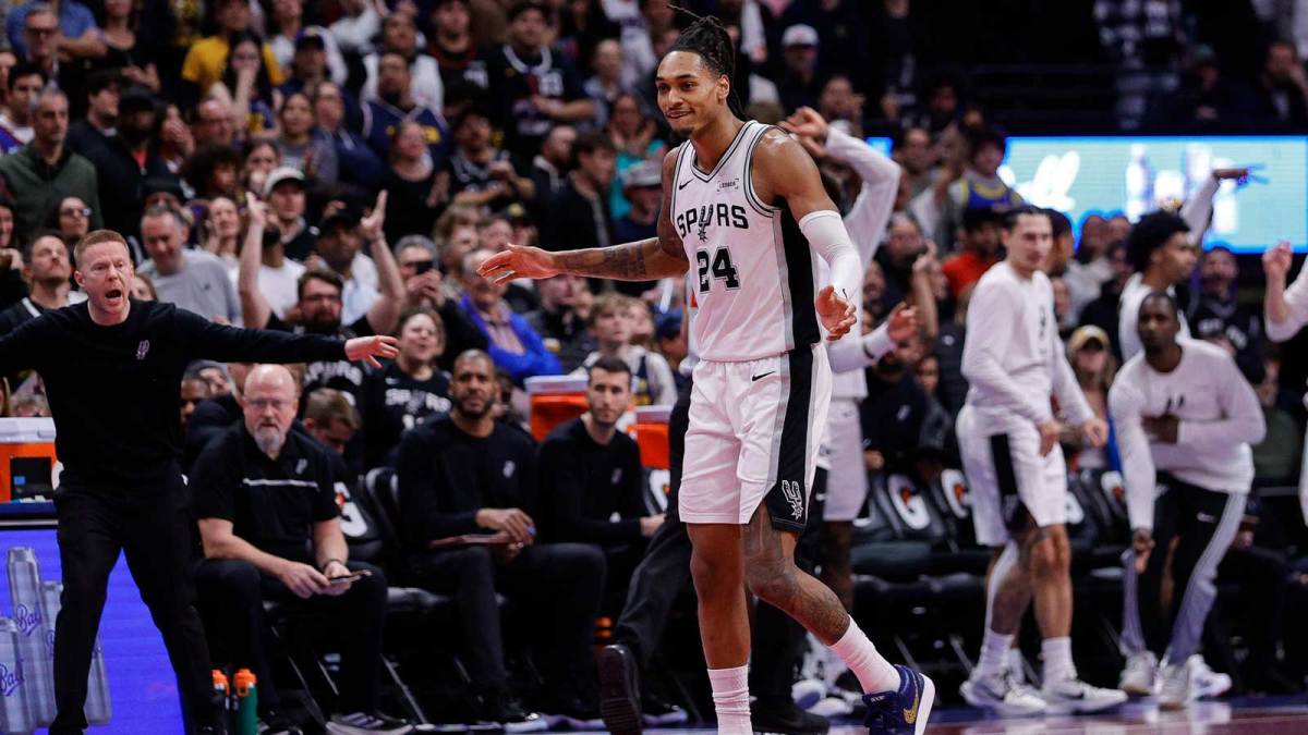 Nov 28, 2025; Denver, Colorado, USA; San Antonio Spurs guard Devin Vassell (24) reacts after a play in the fourth quarter against the Denver Nuggets at Ball Arena. Mandatory Credit: Isaiah J. Downing-Imagn Images