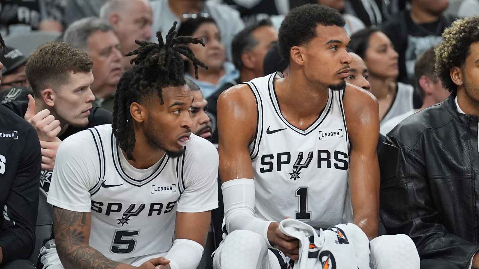 https://wp.clutchpoints.com/wp-content/uploads/2025/11/San-Antonio-Spurs-guard-Stephon-Castle-5-and-San-Antonio-Spurs-forward-Victor-Wembanyama-1-look-on-in-the-first-half-against-the-Brooklyn-Nets-at-Frost-Bank-Center.jpg