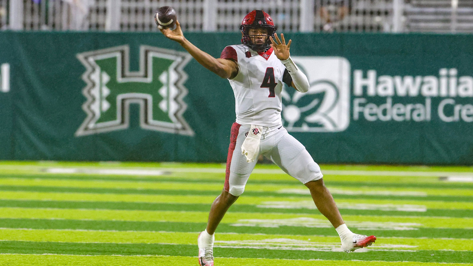 San Diego State Aztecs quarterback Jayden Denegal (4) makes a pass against the Hawaii Rainbow Warriors at Clarence T.C. Ching Athletics Complex.