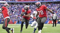 Tampa Bay Buccaneers running back Sean Tucker (44) runs for a touchdown against the Buffalo Bills during the third quarter of the game at Highmark Stadium.