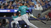 Seattle Mariners second baseman Jorge Polanco (7) hits an RBI single against the Toronto Blue Jays in the eighth inning during game one of the ALCS round for the 2025 MLB playoffs.