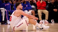 Houston Rockets center Alperen Sengun (28) sits on the court during a break in the action against the Washington Wizards during the second quarter at Toyota Center.