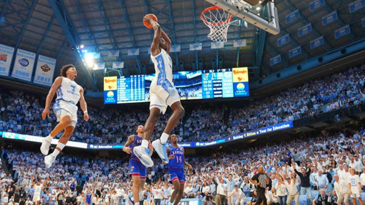 North Carolina Tar Heels forward Caleb Wilson (8) dunks the ball as guard Seth Trimble (7) is in the background near the end of the second half at Dean E. Smith Center.