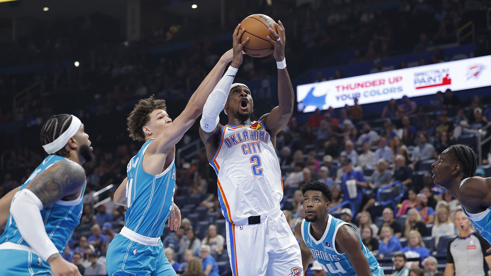 Oklahoma City Thunder guard Shai Gilgeous-Alexander (2) shoots against the Charlotte Hornets during the second quarter of a game between the Charlotte Hornets and the Oklahoma City Thunder at Paycom Center.