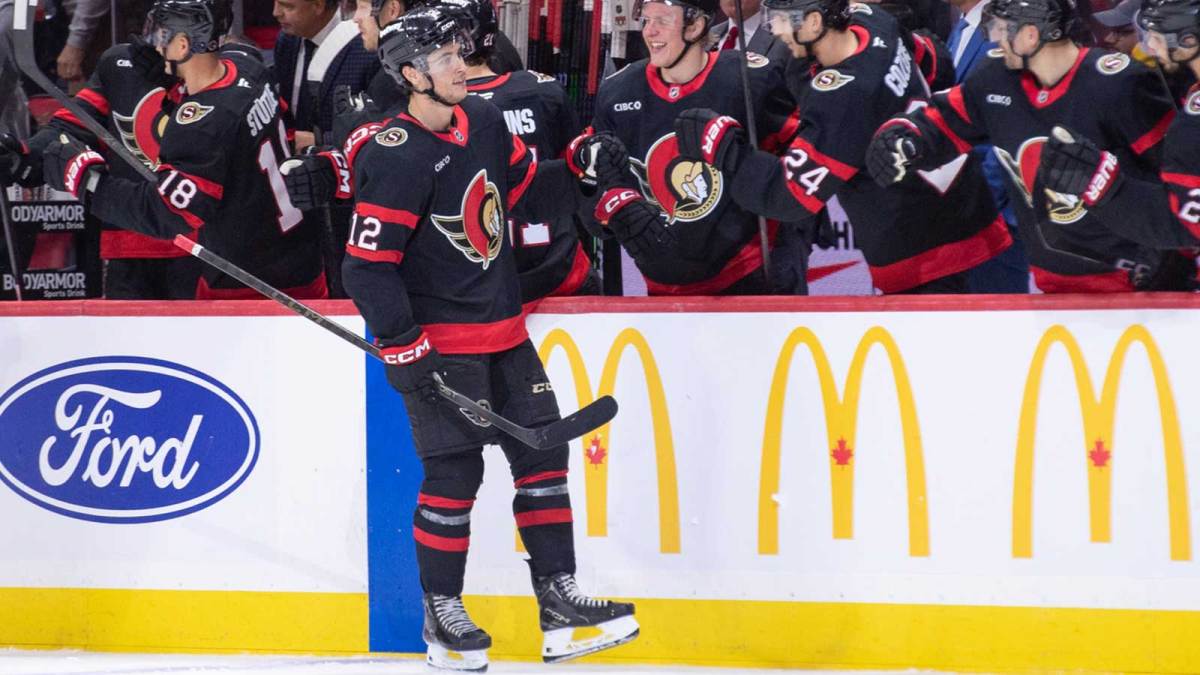 Ottawa Senators center Shane Pinto (12) celebrates with team his goal scored in the second period against the New York Islanders at the Canadian Tire Centre