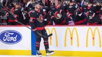 Ottawa Senators center Shane Pinto (12) celebrates with team his goal scored in the second period against the New York Islanders at the Canadian Tire Centre