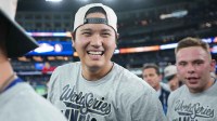 Los Angeles Dodgers two-way player Shohei Ohtani (17) reacts after defeating the Toronto Blue Jays in the eleventh inning for game seven of the 2025 MLB World Series at Rogers Centre.