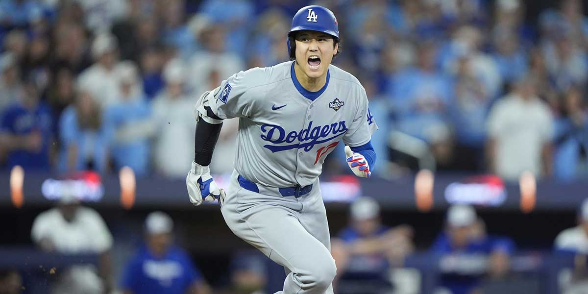 Los Angeles Dodgers two-way player Shohei Ohtani (17) runs after hitting a single against the Toronto Blue Jays in the fifth inning during game seven of the 2025 MLB World Series at Rogers Centre.