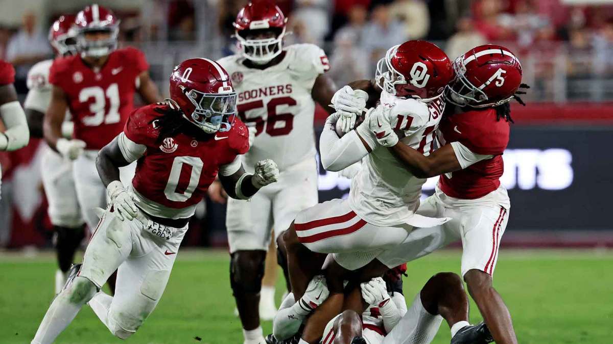 Oklahoma Sooners wide receiver Javonnie Gibson (11) is tackled by Alabama Crimson Tide wide receiver Germie Bernard (5) during the fourth quarter at Saban Field at Bryant-Denny Stadium.