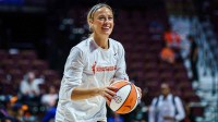 Indiana Fever guard Sophie Cunningham (8) warms up before the start of the game against the Connecticut Sun at Mohegan Sun Arena.