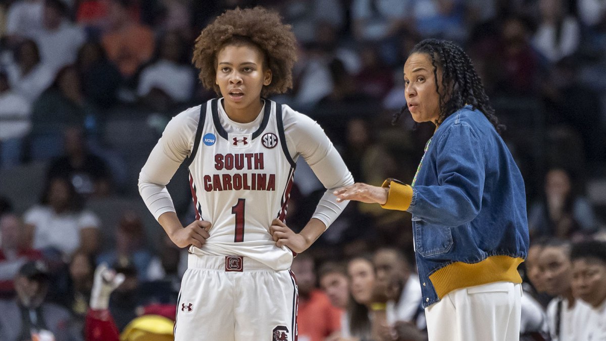 South Carolina Gamecocks head coach Dawn Staley works with guard Maddy McDaniel (1) during the first half of a Sweet 16 NCAA Tournament basketball game against the Maryland Terrapins.