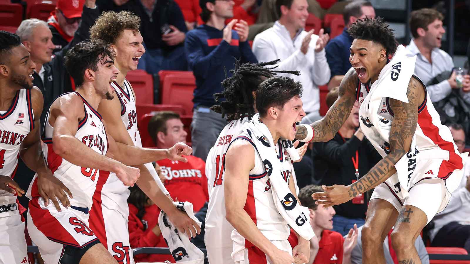 The St. John's Red Storm celebrate from the bench in the second half against the Quinnipiac Bobcats at Carnesecca Arena.