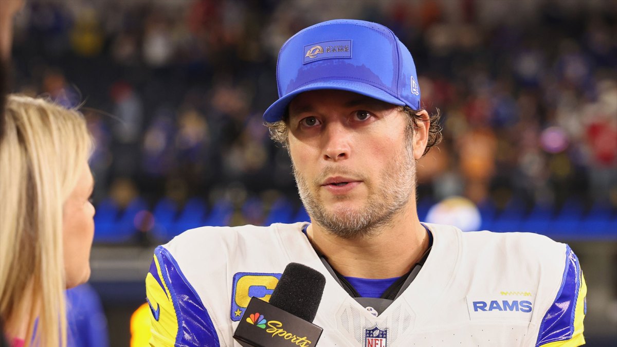 Los Angeles Rams quarterback Matthew Stafford (9) stands on the field for an interview after the game against the Tampa Bay Buccaneers at SoFi Stadium.