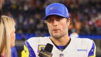 Los Angeles Rams quarterback Matthew Stafford (9) stands on the field for an interview after the game against the Tampa Bay Buccaneers at SoFi Stadium.